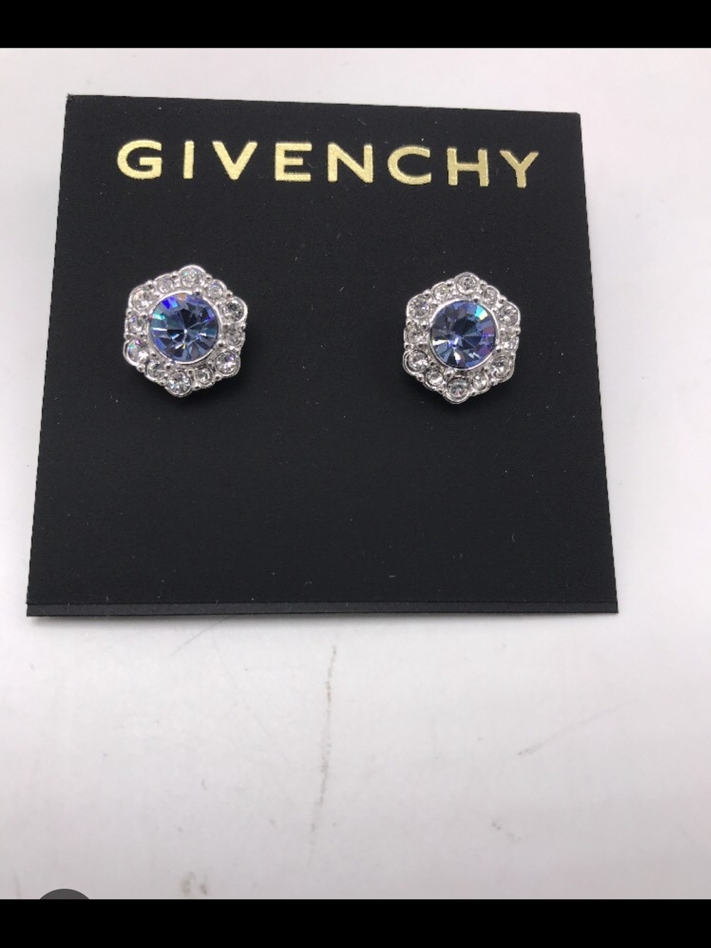 Givenchy Silver Floral Stud Earrings with Iridescent Blue Centers